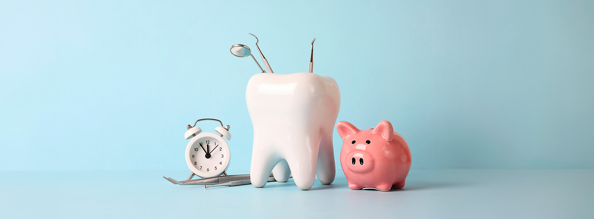 An illustration depicts two toothbrushes with a piggy bank, a clock, and a toothpick character on a blue surface.