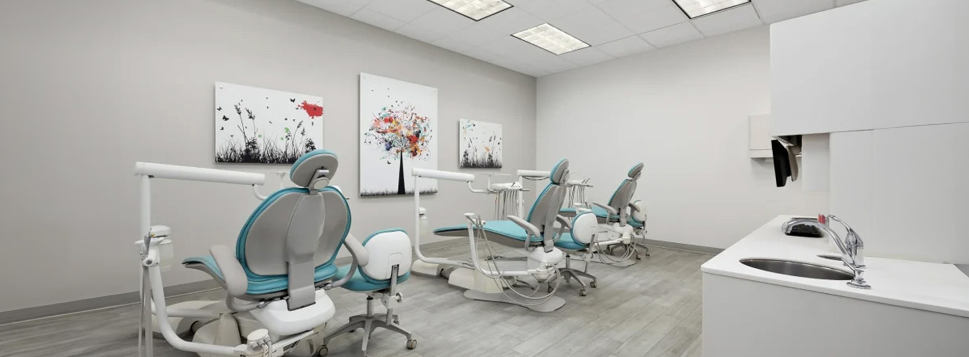 The image shows a dental office interior with various pieces of equipment, including chairs, a desk, a sink, and a lamp, all set against a white background.