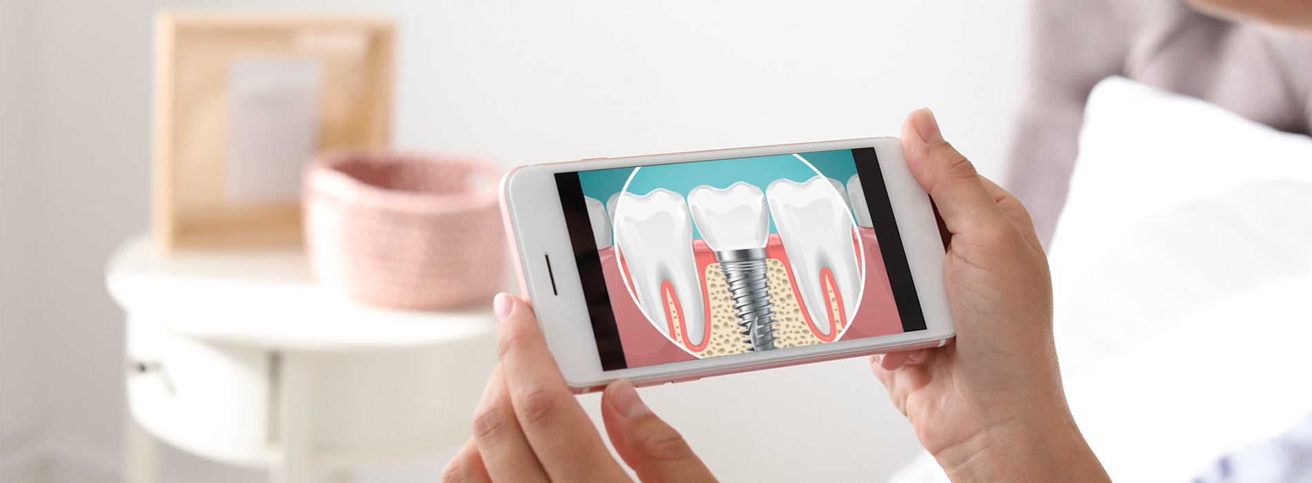 A person holding a smartphone displaying an image of a toothbrush with a dental care advertisement.